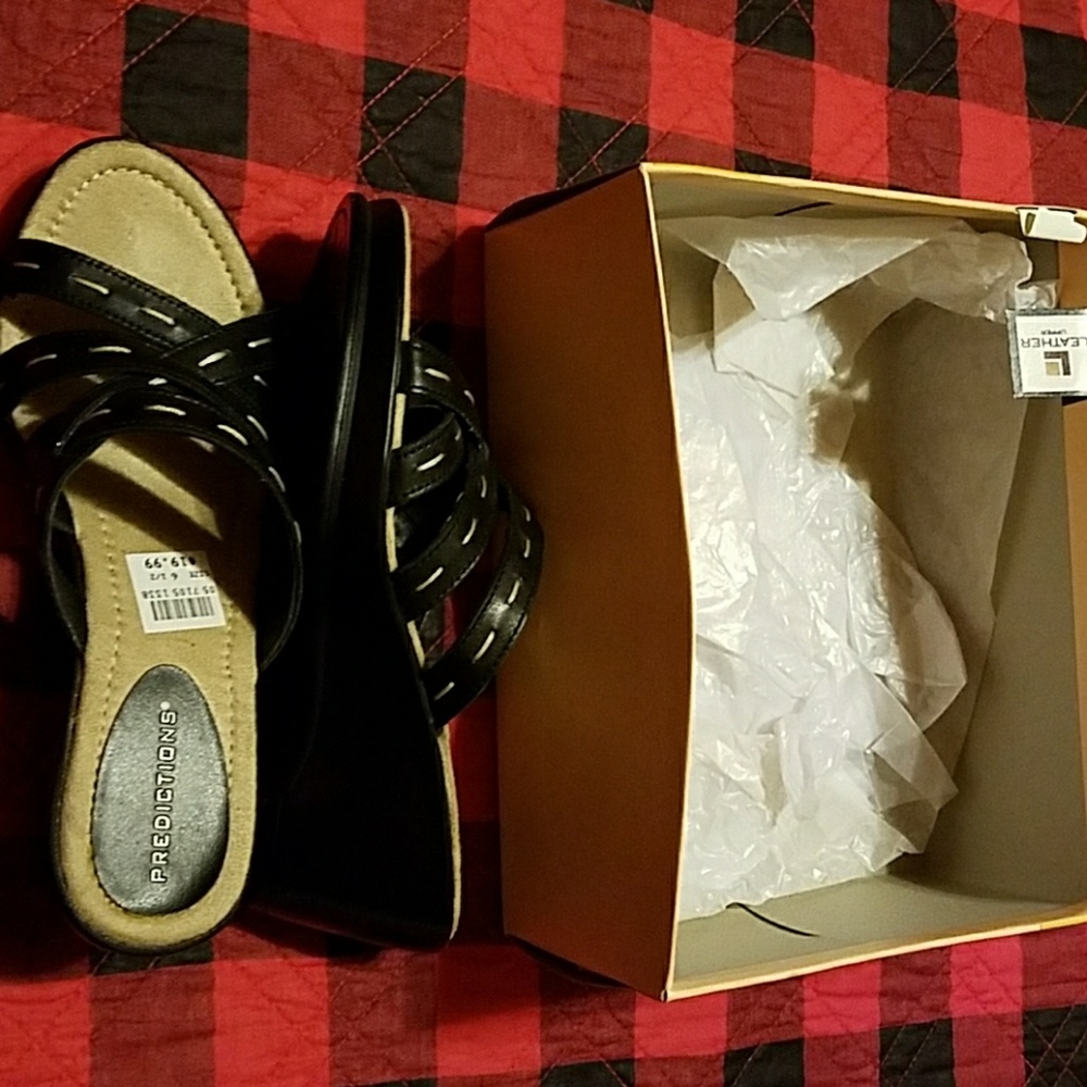 Black Prediction leather sandals